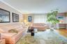 With the dining room table behind, take in the extra large couches - plenty of room for all of your furniture
