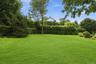 Expansive level lawns create an extraordinary setting for outdoor living.