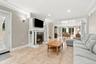 French doors extend the living space effortlessly to the private grounds.