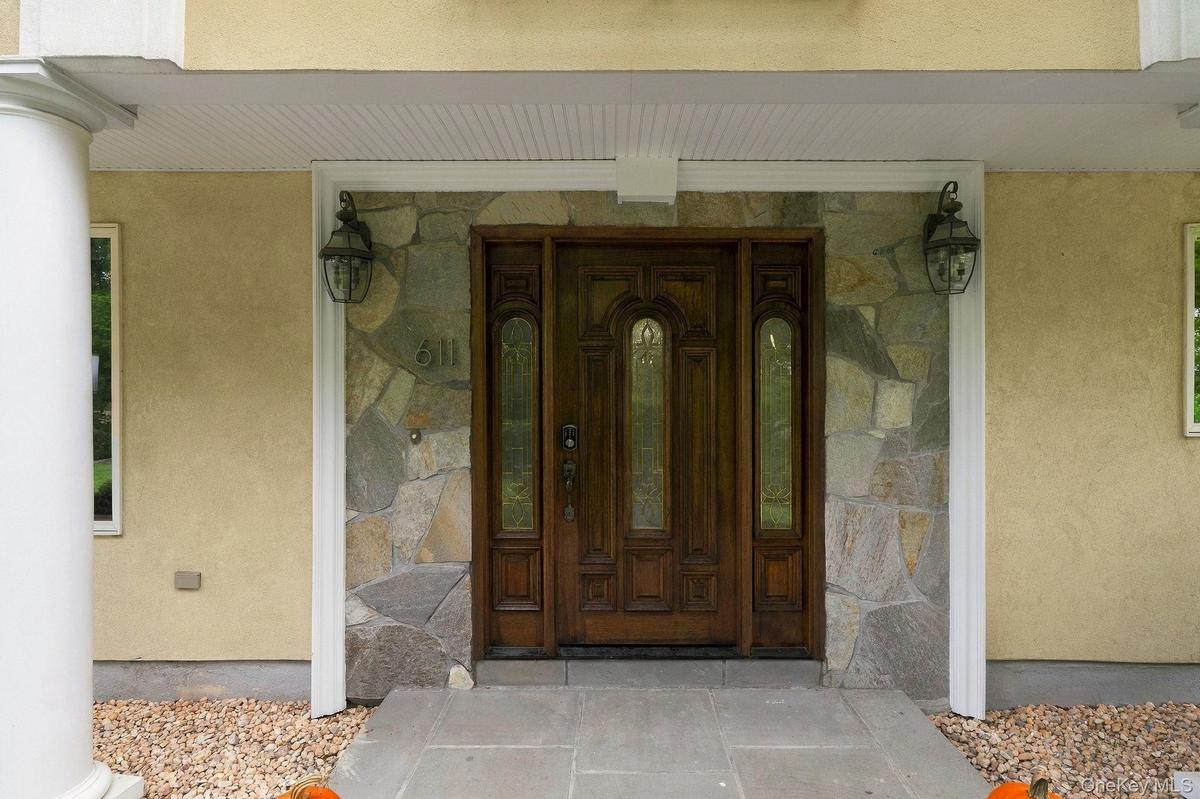Graceful proportions and architectural details create a commanding first impression.