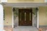 Graceful proportions and architectural details create a commanding first impression.