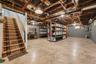 Virtually Staged. Basement showcasing the generous open space, storage areas, and workshop potential.