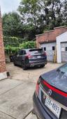 Two Car Garage And Parking Area