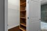 Walk In Closet In Primary Bedroom