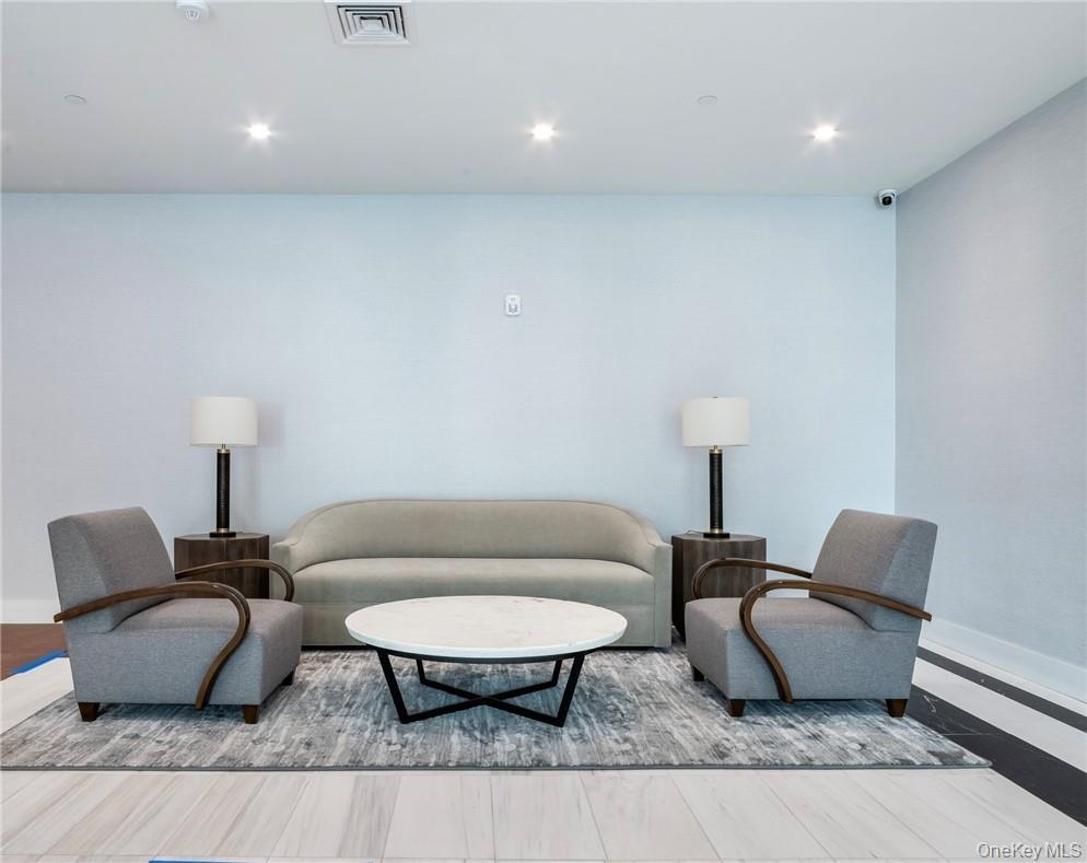 Living room featuring hardwood / wood-style flooring