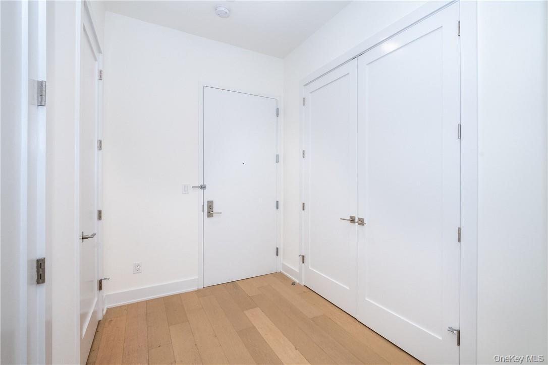 Hallway featuring light hardwood / wood-style floors