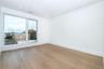Empty room featuring hardwood / wood-style flooring