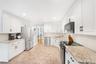 Kitchen w/ quartz countertops