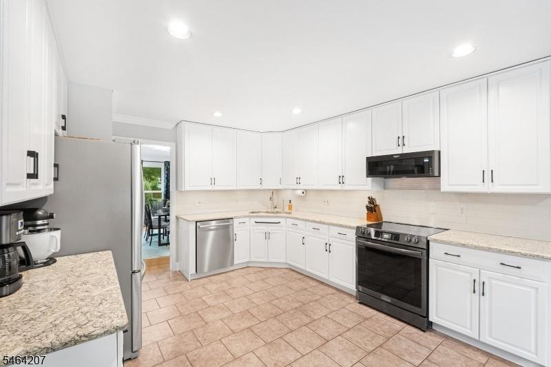 Kitchen w/ custom cabinetry