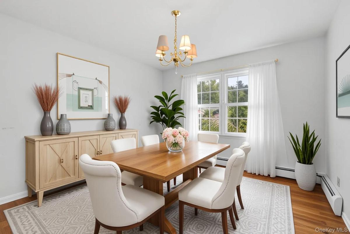 The formal dining room is perfect for entertaining guests.