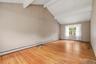 The living room is the full width of the home.