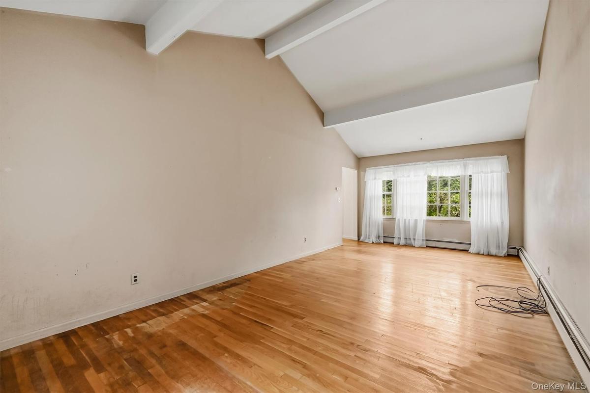 Hardwood floors and oversized windows for plenty of sunshine.