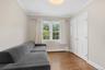 Third bedroom with double closet and window views.