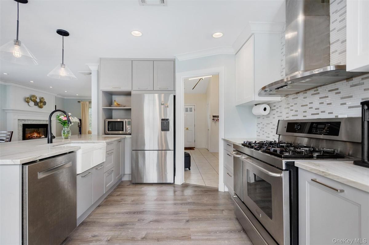 Kitchen facing foyer.