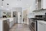 Kitchen facing foyer.
