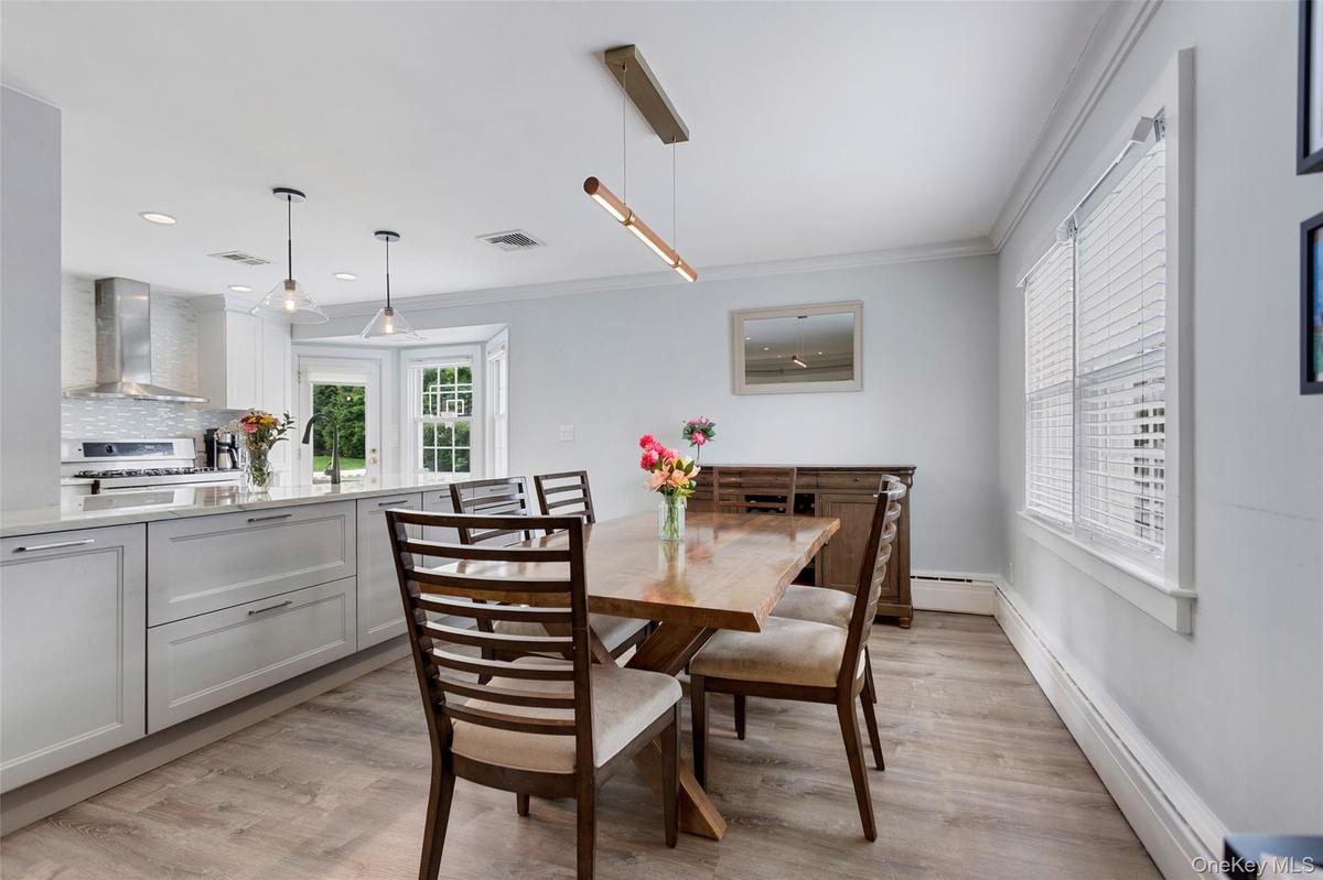 Dining area with view of kitchen.