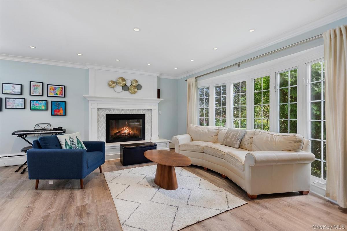 Bright living room with bay window.