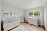 Virtually staged 3rd bedroom with brand new floors.