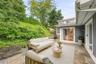 Virtually staged blue stone patio.
