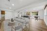 Virtually staged lower level with brand new floors & fresh paint.