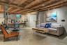 Beautifully finished walk-out lower level- phenomenal space w/fireplace and full bath.  Media room/office/studio/guest suite