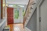 Graciously sized foyer/gallery. Stairs to second level