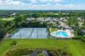 Private tennis courts, resort-style swimming pool, and kiddie pool