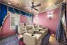 Tiered seating with wall sconces, ceiling fan
