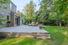 Expansive outdoor decking with slatted floorboards