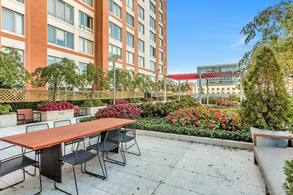View of patio with outdoor dining area