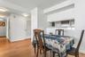 Dining space with light wood-type flooring and baseboards