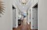 Entry hall with guest bedroom on either side