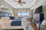 Primary bedroom boasts waterfront views