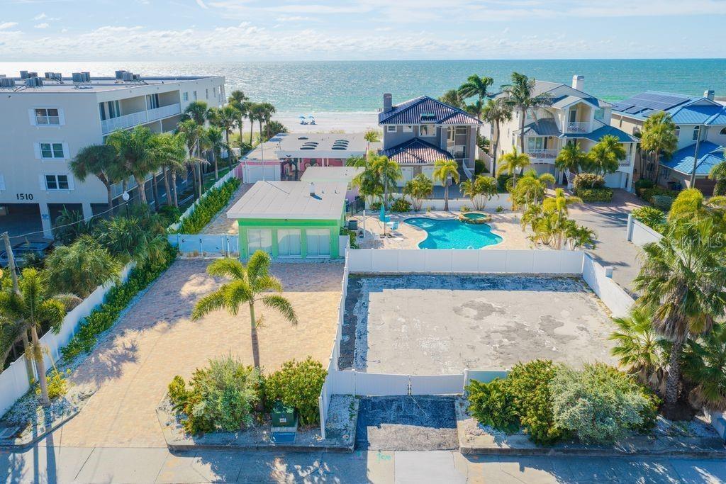 Abundant parking, huge pool, additional  lot-all fenced and very private-imagine the possibilities!