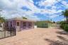 Two additional buildings!  Separate fully furnished one bedroom apartment and separate fully furnished efficiency