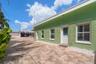Brick paved entry area-lots of room for additional parking and space to enjoy.