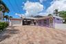 Colorful and appealing property offering flexibility in use-single family with income potential or redevelopment considering its zoning and size of pr