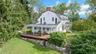 Sited  on a quiet country road w/   high ceilings and graciously sized  rooms - all overlooking the exceptional property.