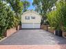 Additional driveway with 3 car garage