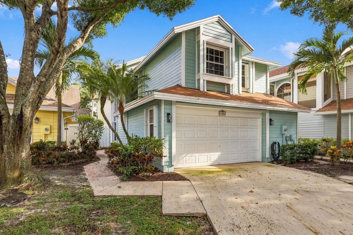 Located in a gated community in the heart of Boca Raton, this beautifully updated three bedroom, two and a half bathroom home with a loft is truly mov