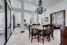 Dining area with sliders that lead to pool!