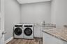 Spacious interior laundry.
