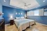 Serene guest bedroom with coastal-inspired blue tones.