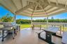 Private island gazebo with grill, BBQ, and reservable access.