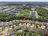 Aerial view of the home within the Mariposa community