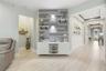 Living room accent wall with built-ins and lighting