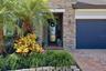 Front entry with keypad lock and landscaped beds