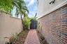 side secure gate by garage entry