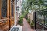 5th Ave NE side entrance with secure gate
