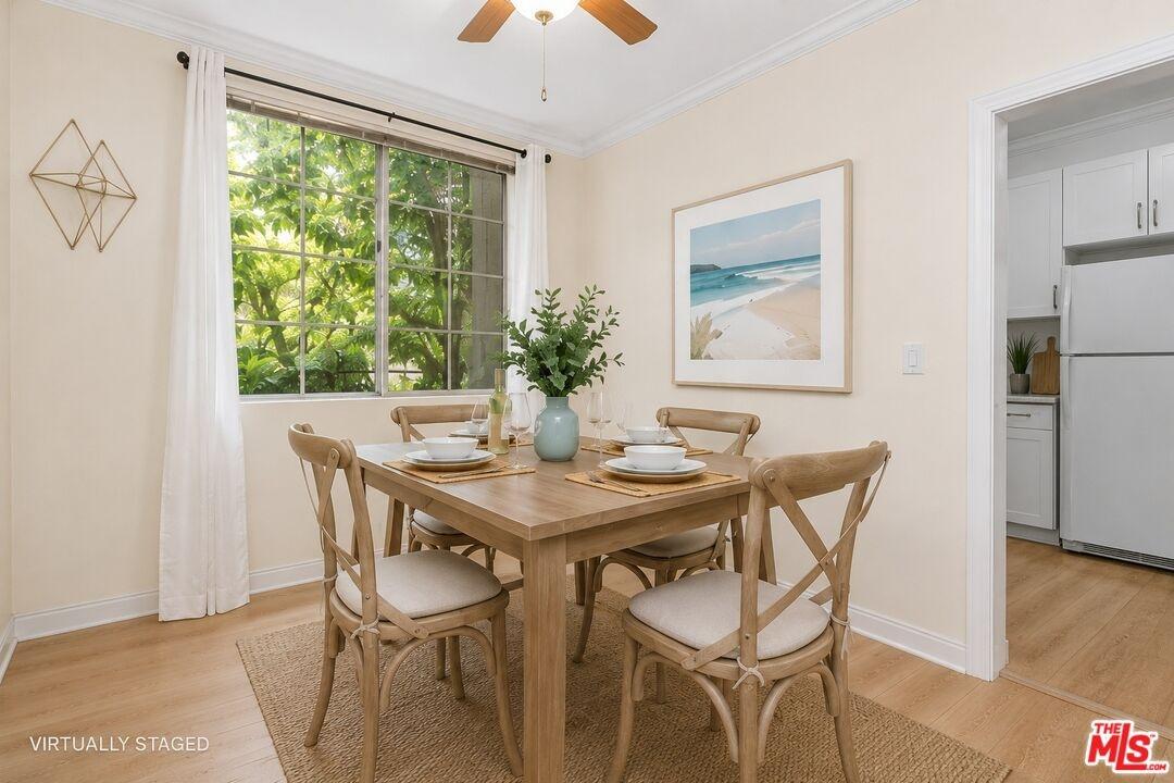 DINING AREA WITH A WINDOW FOR